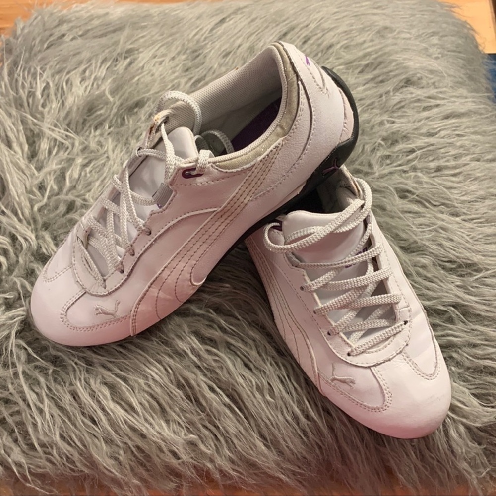 Women’s white Puma runners